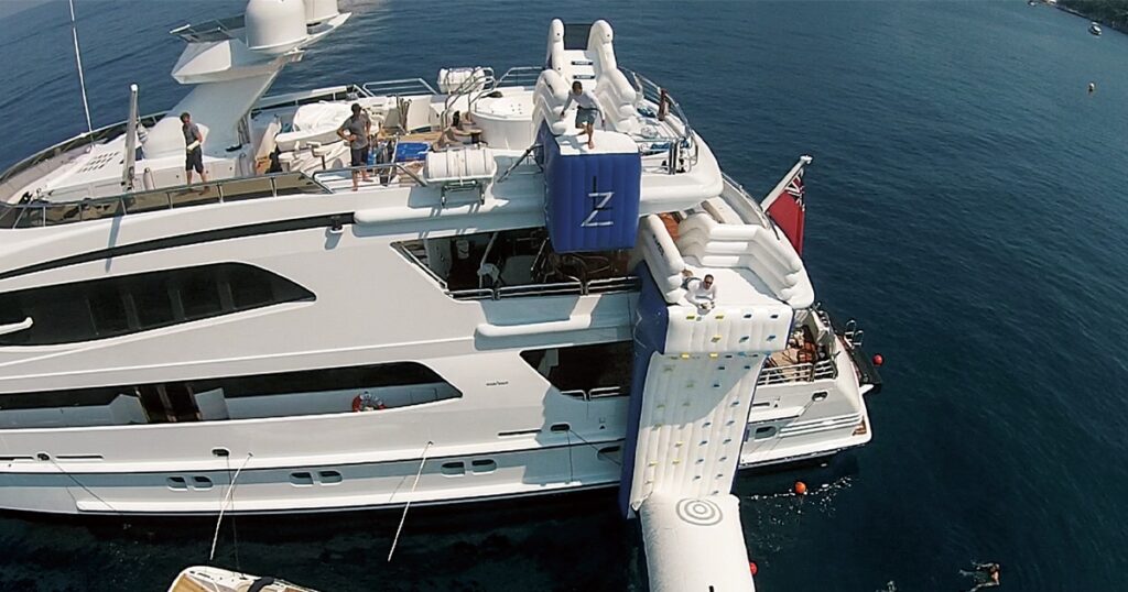 Charter passenger jumping off the FunAir Leap of Faith on MY Lazy Z