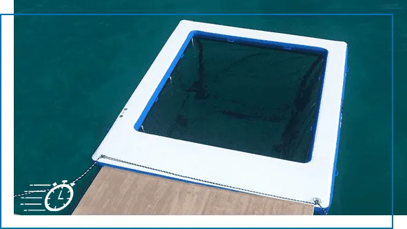 Overhead product shot of a white and blue FunAir inflatable sea pool frame on a yacht deck