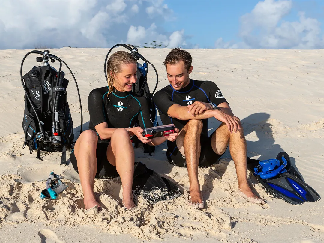 Charter-superyacht-guests-on-beach-wearing-SCUBAPRO-gear