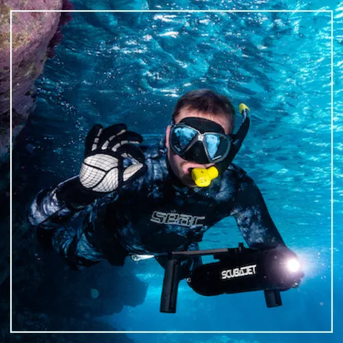 Man SCUBA diving using a SCUBAJET Portable