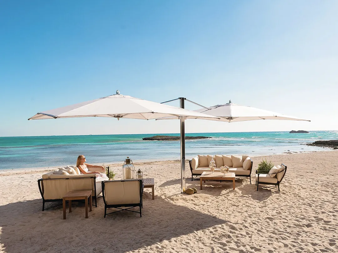 Superyacht beach day set up including TUUCI Dual Cantilever parasols