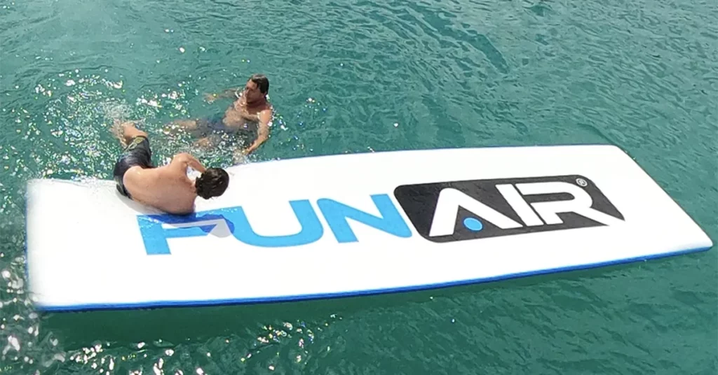 Men playing on a FunAir Inflatable Water Mat