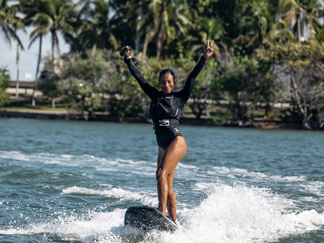 happy superyacht guest on a board from MoreFun brand Awake