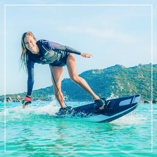 superyacht charter guest riding an Awake Board