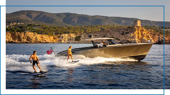 yacht guests riding Awake boards next to a superyacht tender