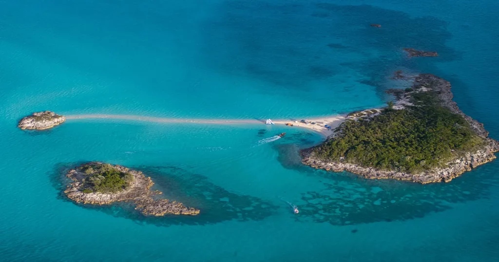 superyacht charter guests visiting a secluded island in the caribbean